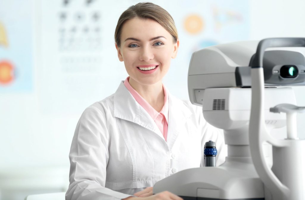 A female optometrist smiling