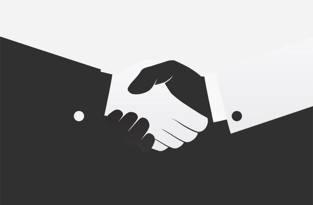 Black and white handshake icon. two people agree to a partnership.